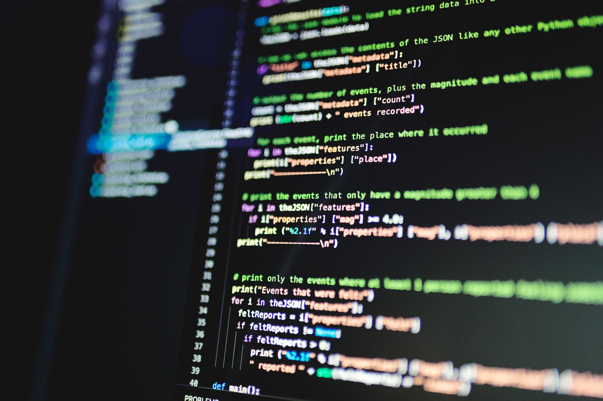 A developer working at a screen of code